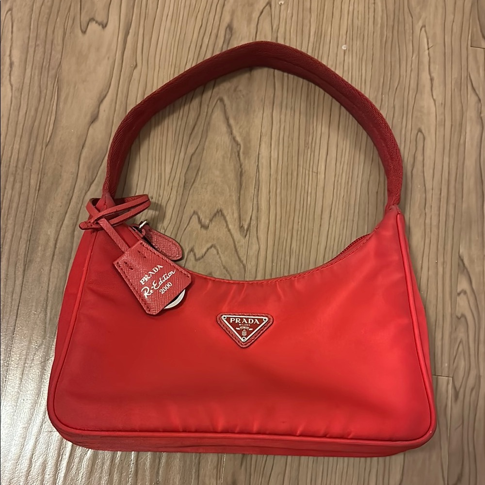 Prada Red Shoulder Bag with Sleek Hobo Silhouette